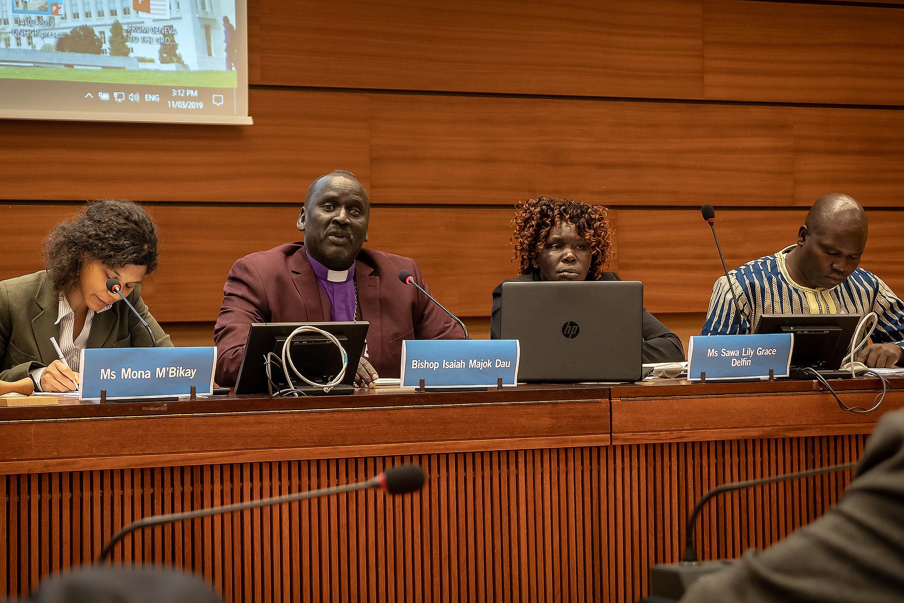 South Sudan civil society representative Ms Lilly Grace Delfin (second right) said there are critical gaps in addressing gender-based violence. Panelists at the human rights side event moderated by Ms Mona M’Bikay, Executive Director, UPR Info (left) included Bishop Isaiah Dau, South Sudan Council of Churches (second left) and Mr Jame David Kolok Joshua (far right), South Sudan Civil Society Coalition on the UPR. LWF/A. Danielsson