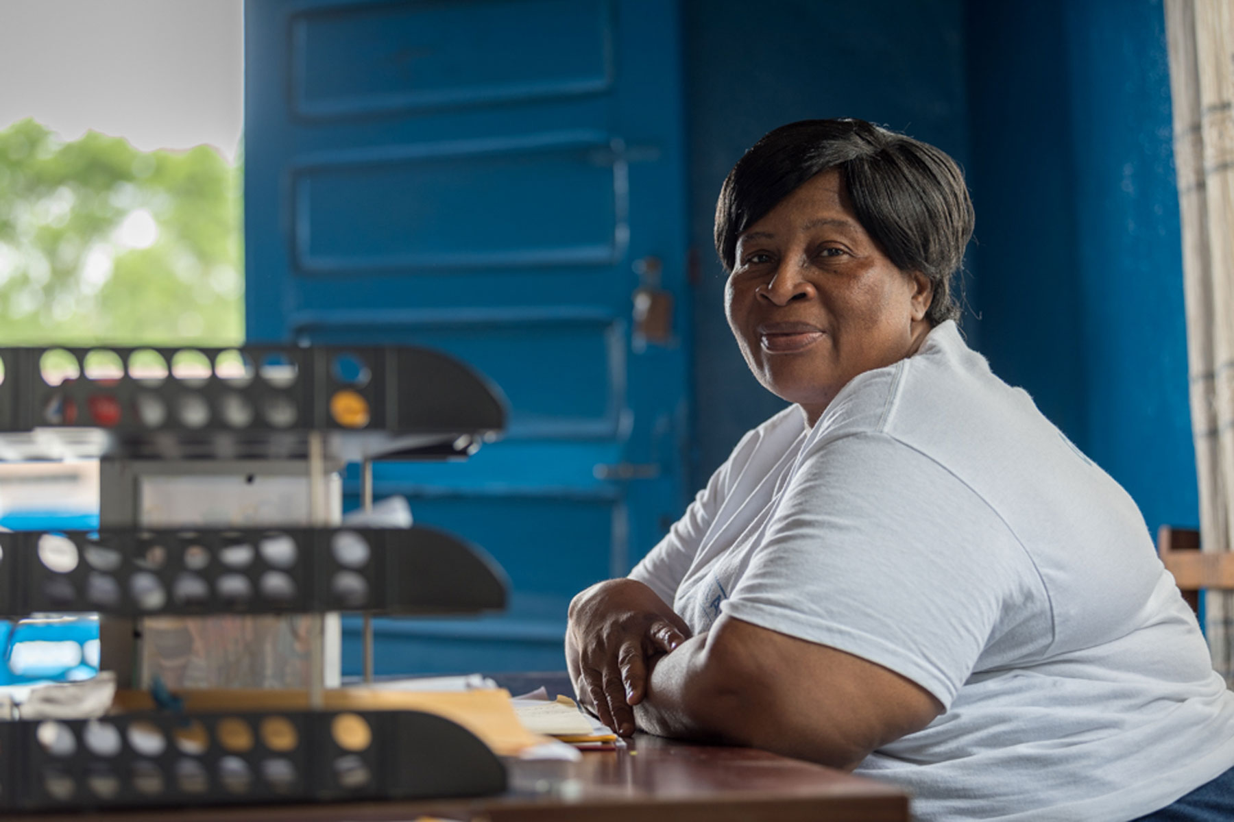 Mariama Z. Brown sits in her office at Mother Tegeste Stewart.