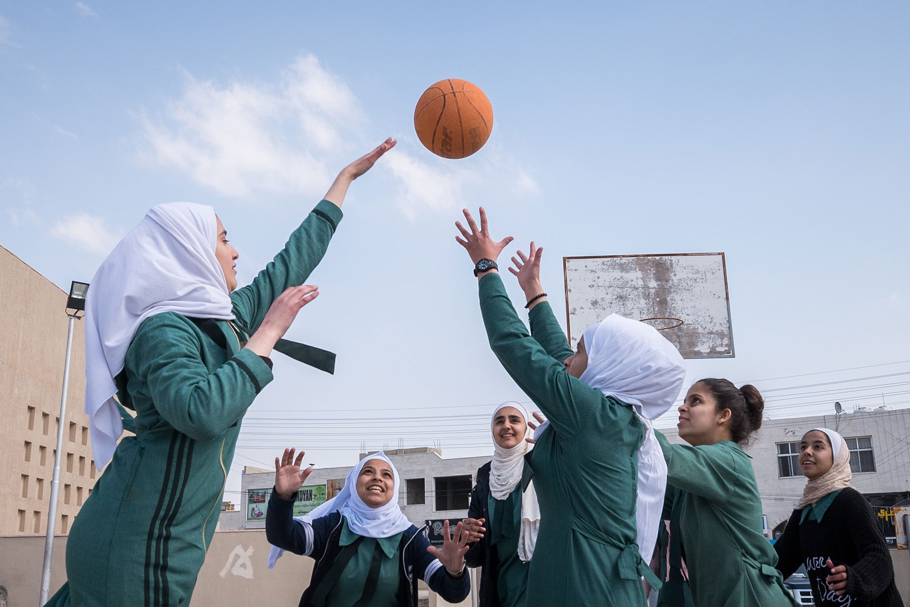 Basketball training is underway at Rufaida Al Aslamieh. The school serves more than 1,000 students from kindergarten age up to 10th grade, most of them girls from Jordan but also some from Syria and other countries.