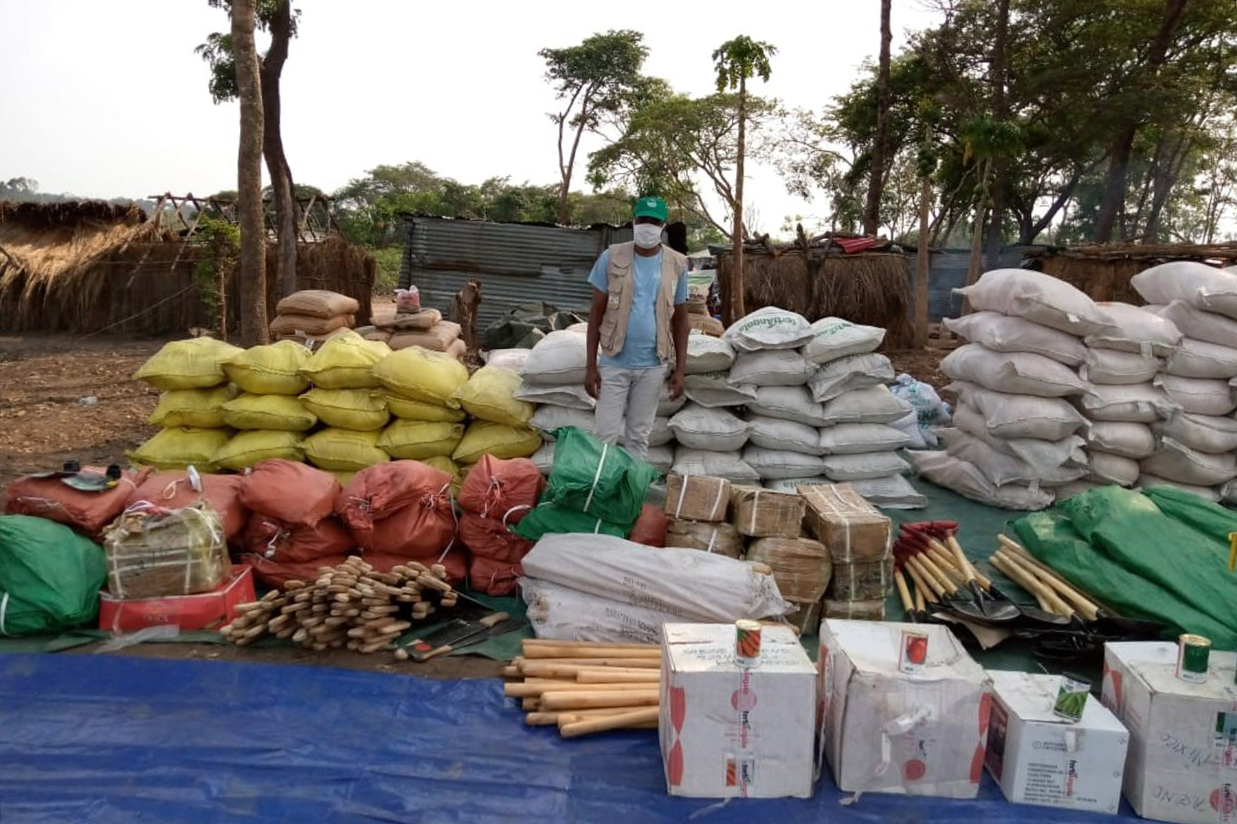 LWF hands over agricultural tools to farmers in Luau, Angola, at the start of the 2020/21 farming season. Photo: LWF Angola