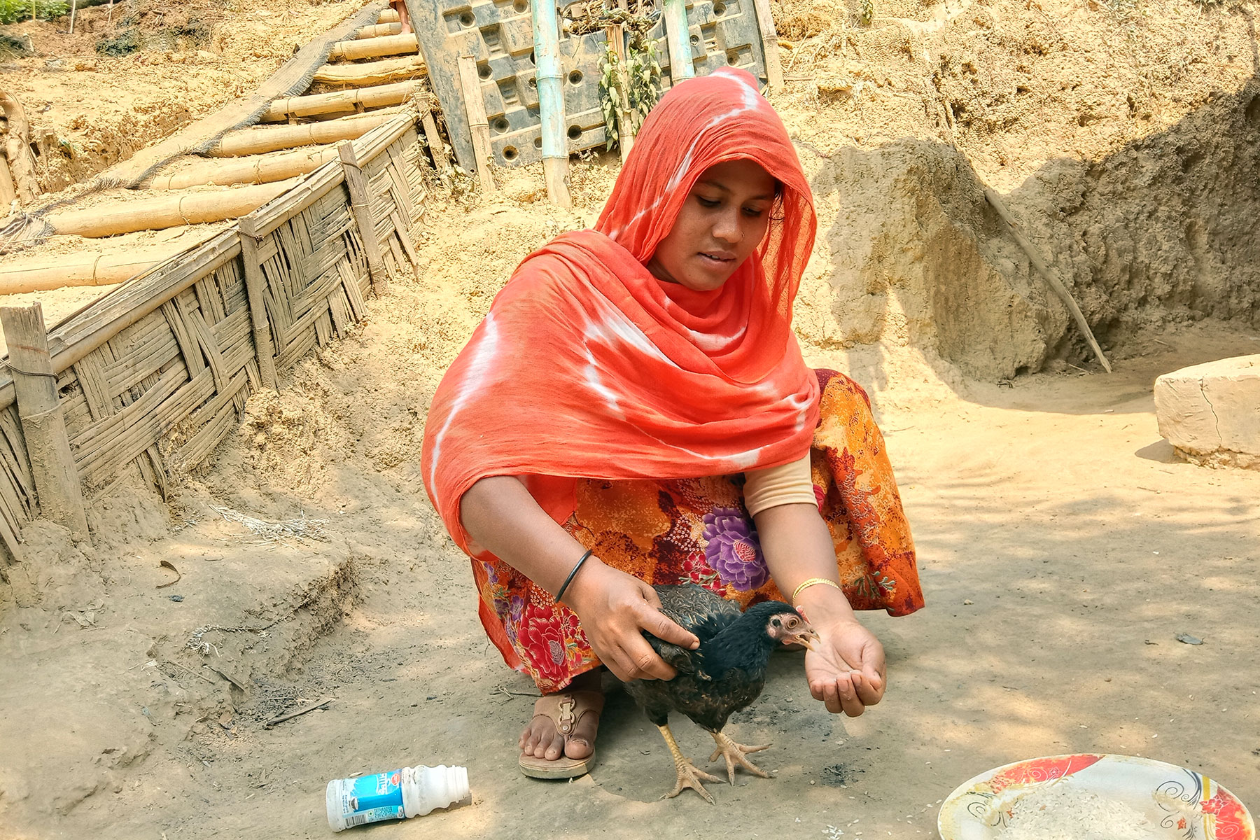 Cash for work schemes are a common way to provide people with employment and income. For single mothers and people living with disabilities however, opportunities are very limited. LWD/ RDRS in Bangladesh distributed poultry to women-headed households and persons with disabilities, to provide a home-based source of income. At the same time, having chicken and eggs at home improves the diet for the family. LWF also distributed additional food such as milk powder, seasonal fruit and sugar to nursing mothers. Photo: Bela Wadud, RDRS/LREP