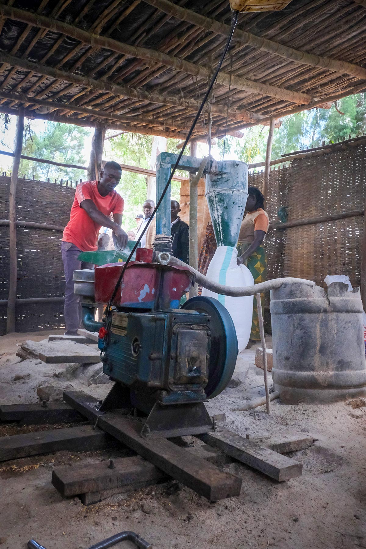 Jonas Hakizimana uses their new milling machine