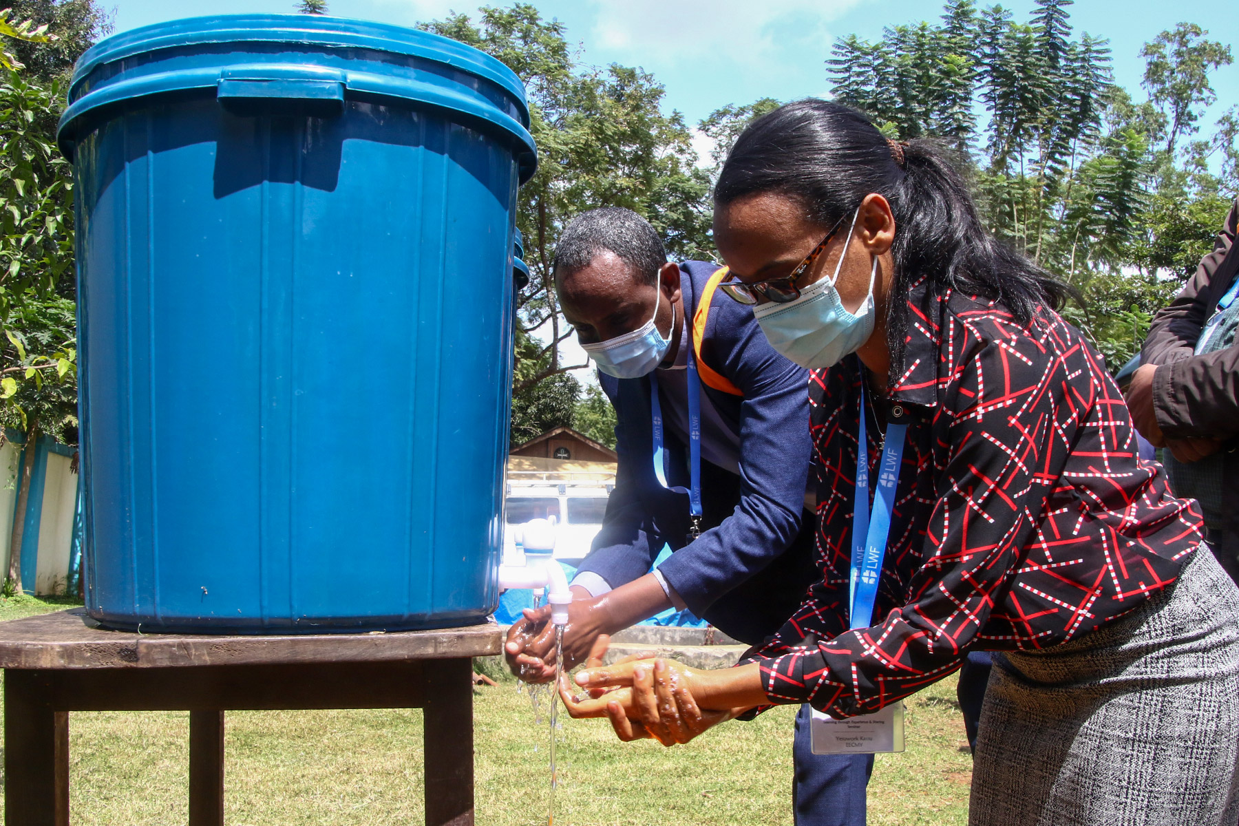 Director of the EECMY Children’s Ministry, Yesuwork Kassu, washes her hands after visiting the ELCT “Radio Voice of the Gospel” in Moshi, Tanzania. E.Adolph/ELCT