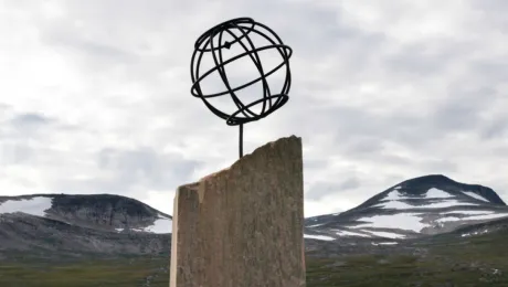 A monument marks the Arctic Circle in Saltfjellet, Norway. Snow previously covered these mountaintops all year round. Photo: Ryan Rodrick Beiler