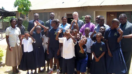 The Lutheran leaders with children residing at the ELCT center in Temeke district, Tanzania. Â© ELCT