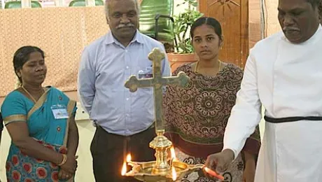 UELCI Executive Secretary Rev. Dr Augustine A. G. Jeyakumar (far right) lights a lamp to inaugurate the YMR 2013 conference in Chennai. Others joining in the symbolic action included (from left to right) Augustina Gerson, Ms Vasuki Jesudoss, Mr J. S. Anbu; and Annes Brida Rose. Â© UELCI