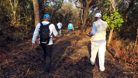 LWF and UNHCR staff survey a site designated for a new refugee camp in Lunda Norte province, northeastern Angola. Photo: LWF 