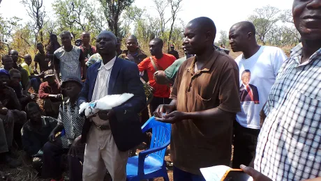  A white dove is part of the ritual for blessing a new refugee camp site in Lunda Norte province, Angola. Photo: LWF Angola