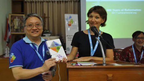 Anne Burghart, Secretary for Ecumenical Relations, with the Chinese translation of the Reformation Booklets. 