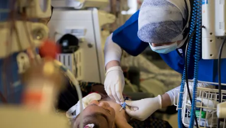 A doctor treats a child at AVH. Photo: LWF/ B. Gray