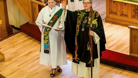 ELCIC National Bishop Susan Johnson (right), with Diaconal Minister Virginia Burke, at the convention closing worship service. Photo: ELCIC