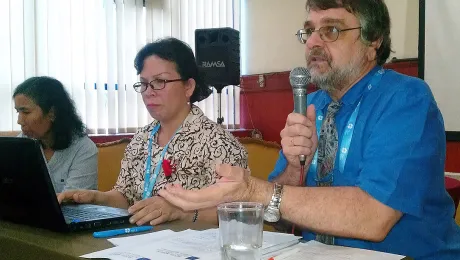 Left to right: Indonesian pastors Rev. Basa Hutabarat and Rev. Dr Raulina Siagian during their presentation, moderated by Rev. Wolfgang Grieninger. Photo: LWF/S. Lawrence