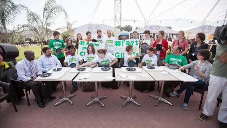 Fasting action at COP20. Photo: LWF/Sean Hawkey