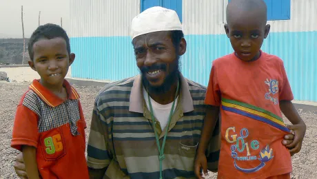 Ahmed with his children in Ali Addeh camp. The family had to flee violence for the safety of the camp in Djibouti. Photo: ALWS/Jonathan Krause 