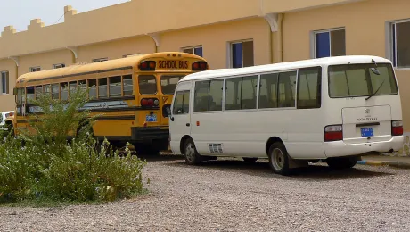 The yellow school bus in Markazi refugee camp that transports children from the refugee camp to school each day. Photo: ALWS/ Jonathan Krause