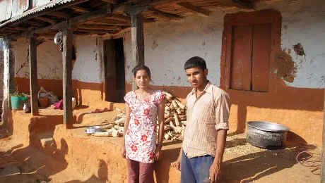 Laxmi and Laxman in front of their house. The outer walls of the house bear cracks. Inside, everything has collapsed. Photo: LWF/ C. KÃ¤stner