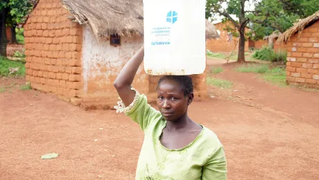 Rebecca Abbo returned to her damaged and empty house in Yongoro village, western CAR, in early May. With LWF's support, she can now access clean water. Photo: LWF/P. Mumia