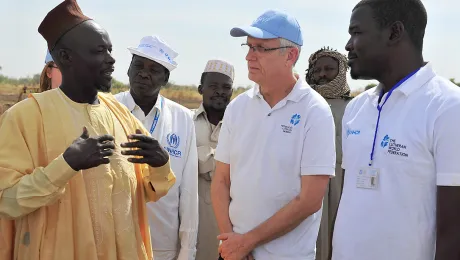 LWF General Secretary Junge met with the chief of Koutoufou village Adam Younouss, who provided the Seeds for Solutions project with land on which refugees from the Djabal camp and villagers from Koutoufou jointly farm. Photo: LWF/A. Danielsson