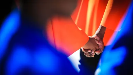 Confirmation students from the Windhoek area clasping hands as they form a Luther Rose at the Global Commemoration of the Reformation in Windhoek, Namibia on 14 May 2017. Photo: LWF/Johanan Celine Valeriano