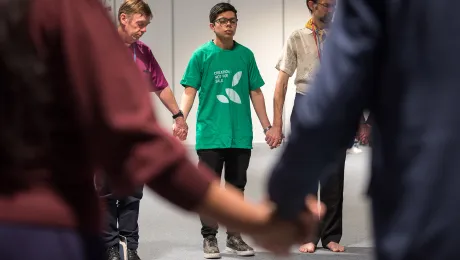 LWF delegates at COP25 in Madrid join other faith-based organizations to pray for urgent and just action to find a way out of the climate crisis. Photo: LWF/Albin Hillert