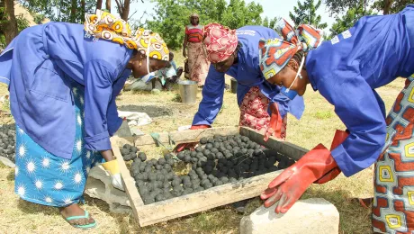 Women in Cameroonâs Minawao refugee camp making ecological charcoal.Â Photo: Notang TOUKAP Justin