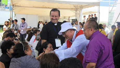 Bishop Medardo GÃ³mez, right, watches theologian Pablo Richard greet Rev. Vilma RodrÃ­guez from the Salvadoran Lutheran Church, who took part in the beatification of assassinated Catholic Archbishop Oscar Romero. Photo: R. Menjivar