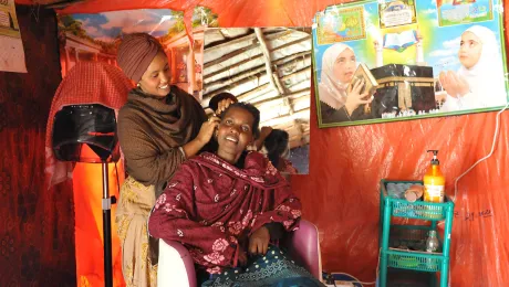 Suhai Ismael Abuker with a customer in her hairdressing salon. Photos: LWF/C. KÃ¤stner