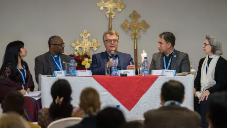 Professor Veli-Matti KaÃrkaÃinnen replies to a response panel to a paper of his. Gathered in Addis Ababa from 23-27 October 2019, Lutherans from across the globe join in consultation under the theme of 'We believe in the Holy Spirit: Global Perspectives on Lutheran Identities'. Hosted by the Ethiopian Evangelical Church Mekane Yesus, the consultation is the first phase of a study process on Lutheran identities. Photo: LWF/Albin Hillert