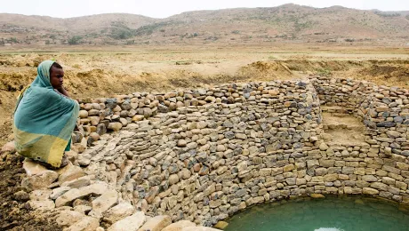 A man at a water harvesting system in Seharti Samre, Tigray. Photo: Hilina Abebe/Norwegian Church Aid (2013)