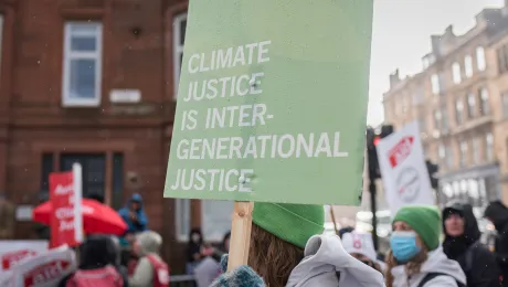 During the UN climate conference COP26, LWF delegates joined a climate march. One banner read âClimate justice is intergenerational justiceâ. Photo: LWF/Albin Hillert