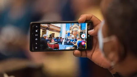 Filming parts of an interfaith service in Garnethill Synagogue, Glasgow, on the opening day of the U.N climate change conference COP26, with representatives from more than ten different religions. Photo: LWF/Albin Hillert 