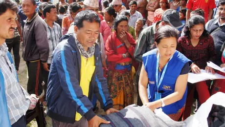 LWF Nepal staff distribute blankets and other items for emergency shelter in Nepal after the earthquake in 2015. Although many of them were affected themselves, all colleagues reported for duty and went out to support those who had lost even more. Photo: LWF/ C. KÃ¤stner 