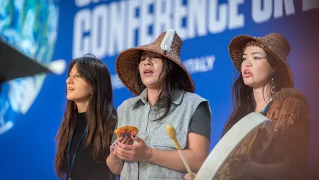 Indigenous Peoples Constituency members speak at the People's Plenary at COP26 in Glasgow, Scotland. Photo: LWF/Albin Hillert