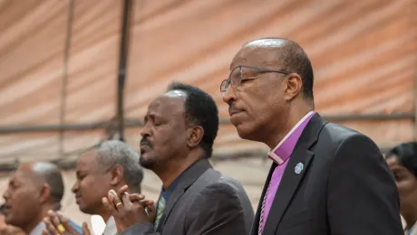 EECMY President Rev. Yonas Yigezu Dibisa and other congregants during Sunday worship in one of the church's congregations in the capital Addis Ababa. Photo: LWF/Albin Hillert 