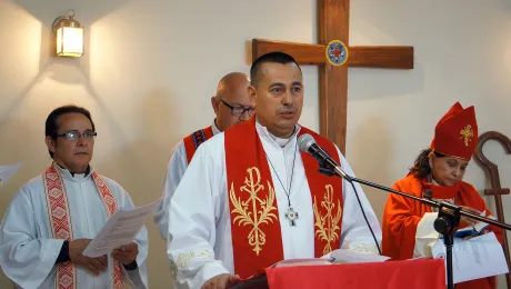 Rev Rolando Antonio Ortez, Pastor President of the ICLH, presides at the ordinations of three male and four female pastors in 2017. Photo: LWF/P. Cuyatti