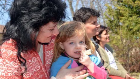 The Evangelical Lutheran Church in Hungary supports Roma families such as Eva's (holding her child) with shelter and advocates for their rights. Photo: TamÃ¡s Kiss