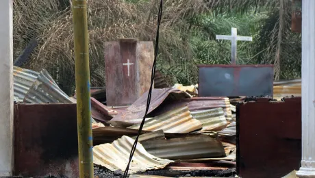 Two crucifixes remain upright in the remnants of an Indonesian church burned in October 2015. Photo: LWF Indonesia