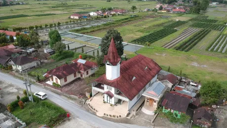 The LWF National Committee in Indonesia installed an internet satellite tower on the properties of four Lutheran churches in remote areas to assist online learning. Church pictured is HKBP. Photo: by Andi Gultom/KNLWF.