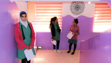 Colorful paint and student art line the hallway.jpg Caption: Proud students in the hallway of the newly renovated school. Photo: LWF/ E.Massell