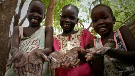 From left to right, 9-year-old Freedom Gai, 7-year-oldÂ NyalatÂ Pouch and 5-year-oldÂ NyabenaÂ GaiÂ show how proper hand washing with soap can prevent the spread of the COVID-19 virus.Â AllÂ Photos:Â LWF/P.Â Kwamboka