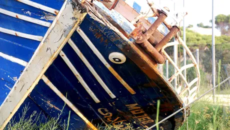 The island of Lampedusa has a so-called shipsâ cemetery, where vessels used by migrants are dumped onshore waiting to be destroyed. Lampedusa is known in Italy for immigration because it is much closer to Africa than Italy or the rest of Europe. Yet, migrants are rarely seen on the streets of the island. Credit: Piervincenzo Canale (CC-BY)