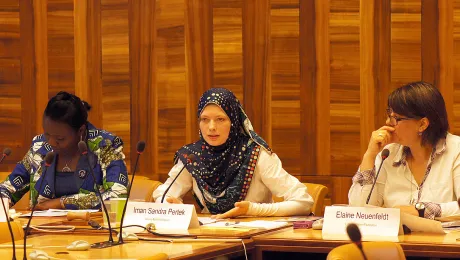 Olga Tshiwewe (WCC), Iman Sandra Pertek (IRW) and Dr Elaine Neuenfeldt (LWF, from left) discuss during the side event on violence against women at the Human Rights Council. Photo: LWF/C.KÃ¤stner