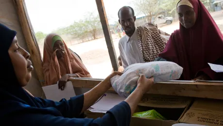 New arrivals at the Ifo refugee camp receive an LWR baby kit as well as other non-food items as they are formally registered during the reception process in Dadaab, Kenya. The Ifo settlement is the oldest of the camps in Dadaab, dating back to the early 1990s. Photo: Jonathan Ernst/LWR (2011)