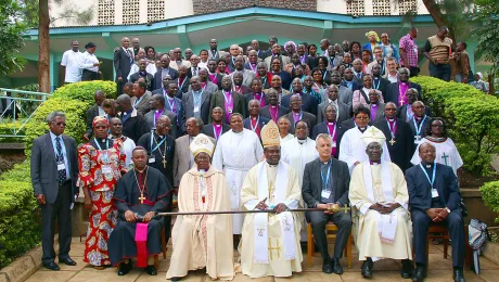 Tanzanian and global Lutheran church leaders gather with other heads of churches in Africa outside the Moshi Town Cathedral. Photo: LWF/Allison Westerhoff 