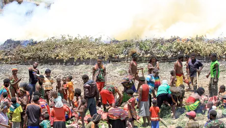 Burning the stone, originally a traditional Papuan way of cooking and also a thanksgiving ceremony, sometimes also the scene for harmful traditional practices. Photo: John Roy Purba/HKBP