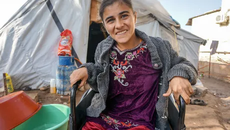 Nisreen Hajiâs face lit up when she was placed into a wheelchair given to her by the Lutheran World Federation and partners CAPNI and Al Ghazel in early December 2014. Photo: LWF/S. Cox