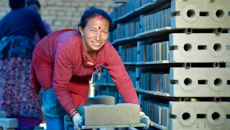 Women in Sanogoan are making the bricks that will form the basis of their new village. Photo: ACT Alliance/Paul Jeffrey