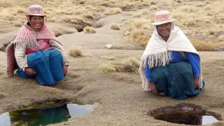 Thanks to an LWF-supported project to bring piped and clean drinking water to the Andean highlands, Filomena Huanaco Casilla (left) and Rosenda Challco Barrera will no longer have to depend on natural but unsafe water sources in their remote village. Photo: LWF/I. Dorji