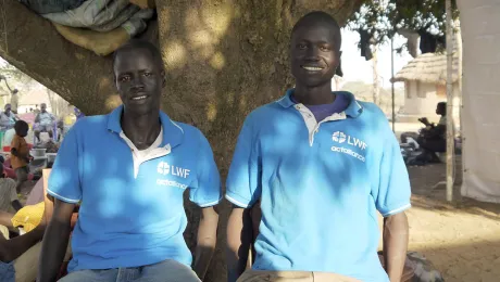 LWF volunteers John Garang and Peter Jok at Adjumani refugee camp, Uganda. DCA/ACT/LWF/Mai Gad