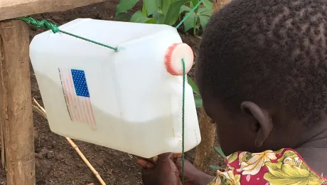 An easily accessible hand-washing point at the Kyangwali refugee settlement, where LWF Uganda receives refugees arriving from neighboring Democratic Republic of  Congo. Photo: LWF/B. Waddell